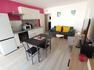 Appartements Appartement Le Grain de Sable : photos des chambres