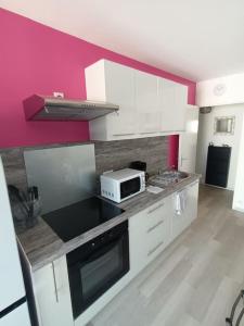 Appartements Appartement Le Grain de Sable : photos des chambres