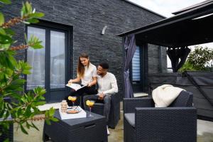 Maisons de vacances TOPAZE Nuitee Romantique avec Jacuzzi : photos des chambres