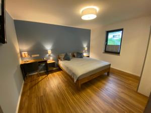 Luxuriöses rollstuhlgerechtes Ferienapartment A1 mit umzäunten Garten, 65qm