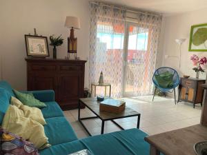 Appartement T2 avec terrasse, parking et WIFI - FR-1-553-203