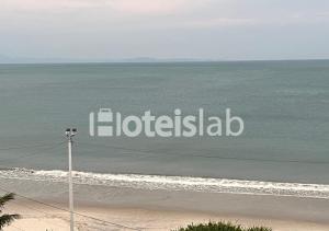 C149 Lindo apartamento de um quarto com vista para o mar