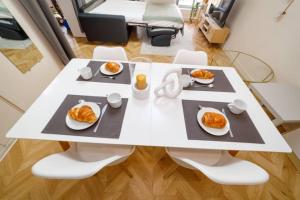 Appartements T2 cozy proche du centre avec canape lit - 51Blatin : photos des chambres