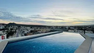 Céntrico Condo vista al Mar con alberca 2br - Agua Escondida