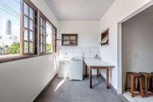 Casa na praia com churrasqueira - Bal. Camboriú