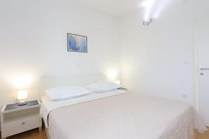 Apartments by the sea Podgora, Makarska - 21817