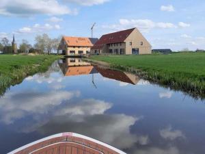 Two adjacent luxury villas in Friesland