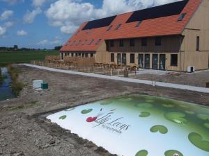 Two adjacent luxury villas in Friesland