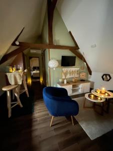 B&B / Chambres d'hotes Grande chambre confortable : photos des chambres