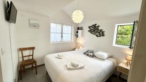 Maisons de vacances Les Alouettes, maison avec studio pour 4 personnes proche de la baie. : photos des chambres