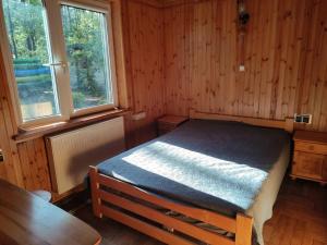 Domek w lesie nad rzeką Świder