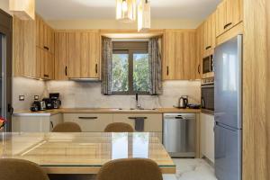 Chris and Stratos villa with private ecologic pool and kids playground!