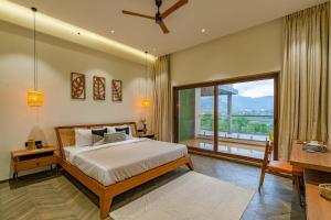 StayVistas Amorist Villa - Amidst Greenery with Terrace, Kids Zone, Snooker Table, Turf