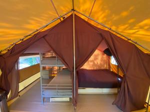 Tentes de luxe Camping la Kahute - Tente lodge au coeur de la foret : Tente