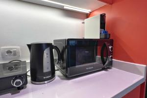 The 2 BDR Emerald Condo 5 min to CAI Airport