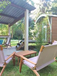 Maisons de vacances La Roulotte a 10min de Disneyland Paris - Cabane & Cabanon : photos des chambres