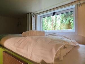 Maisons de vacances La Roulotte a 10min de Disneyland Paris - Cabane & Cabanon : photos des chambres