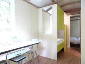 Maisons de vacances La Roulotte a 10min de Disneyland Paris - Cabane & Cabanon : photos des chambres