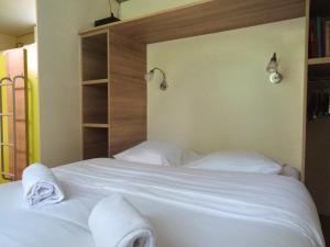 Maisons de vacances La Roulotte a 10min de Disneyland Paris - Cabane & Cabanon : photos des chambres