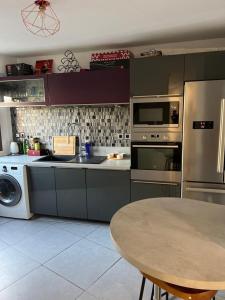 Appartements Appartement 110m2 : photos des chambres
