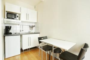 Appartements Pick A Flat's Apartments in Batignolles - Rue Biot : photos des chambres