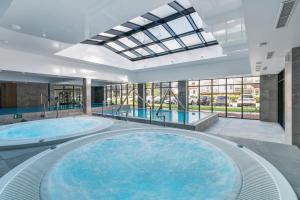 GREEN PORT Apartament Lwowska with SWIMMING POOL Kołobrzeg by Noclegi Renters