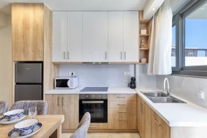 Modern Family apartment Ewa with pool, dining area on Crete coast