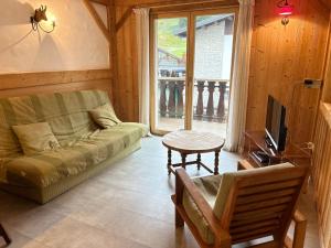 Les Gets: Appartement central 2 ch, balcon, au pied des pistes - FR-1-623-132