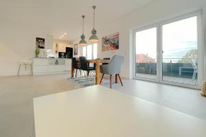 Strandstrasse 21 Ferienwohnung Achterwasserblick