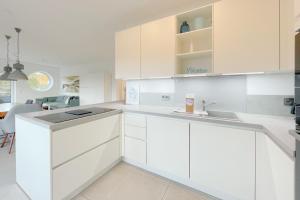 Strandstrasse 21 Ferienwohnung Achterwasserblick