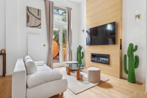 Appartements Suite luxueuse avec jardin prive Sauna et Jacuzzi : photos des chambres