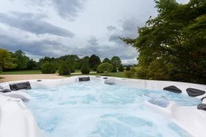 Maisons de vacances L'Atelier 4 stars Luxury, Hot Tub, Pool : photos des chambres
