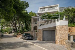 Apartments with swimming pool Brela, Makarska - 19345 