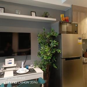 Cozy New 1BR Fame Residences Condo with Balcony