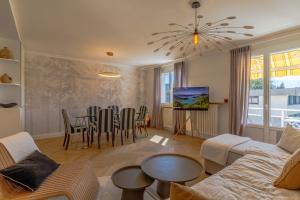 Appartements L'Oasis 4 etoiles - Triangle d'Or, a 100m du Lac, Parking gratuit : photos des chambres