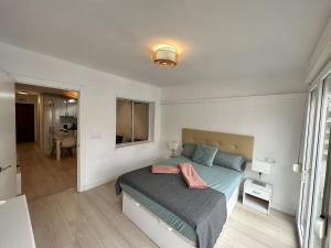Central Apartment with Terrace & Seasonal Pool Walking Distance to the Beach by Namaste Elite