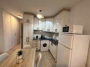 Central Apartment with Terrace & Seasonal Pool Walking Distance to the Beach by Namaste Elite