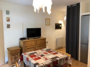 Appartements TERRASSES du GRAND HOTEL connexion WI-FI : photos des chambres