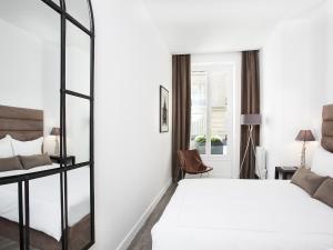 Appartements LivinParis - Luxury 3 Bedrooms Grands-Boulevards I : photos des chambres