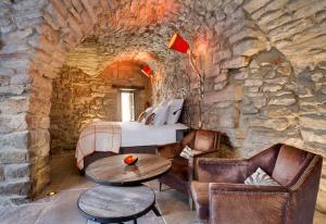 B&B / Chambres d'hotes La Maison du Passage - Chambres - Suites premium, Spa, Piscine et Restaurant : photos des chambres