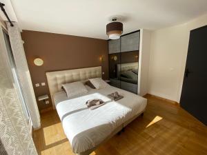 Appartements Le Clos Casi - 3 Vallees - Ski - Cures thermales : photos des chambres