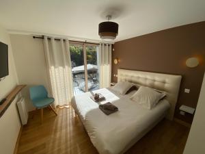 Appartements Le Clos Casi - 3 Vallees - Ski - Cures thermales : photos des chambres