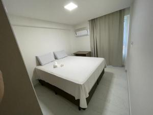 Pé na areia em Ponta de Campina, Paraíba