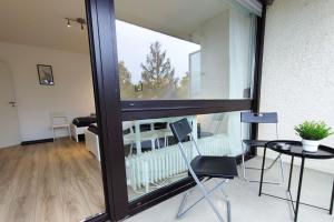 OF14 - Modernes Apartment mit Balkon in Mühlheim