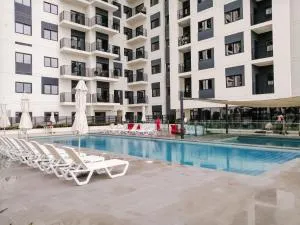 Nasma Luxury Stays - Home-Style 2BR Apartment with a Balcony View - 甘图特