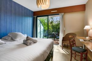 South-facing Double Room room in Hotel Le Pavillon Bleu