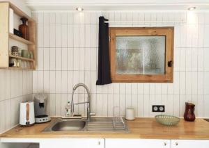 Studio aux Arceaux, sur jardin, dans maison 1900