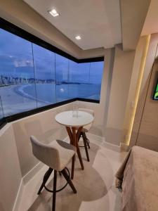 Lindo apto Frente MAR tudo novinho 2suítes+garagem