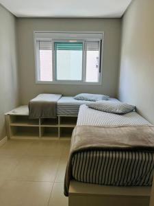 Apartamento na Praia de Palmas com garagem