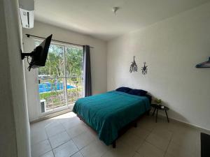 Departamento 2 habitaciones vista a la alberca Creta by EITA